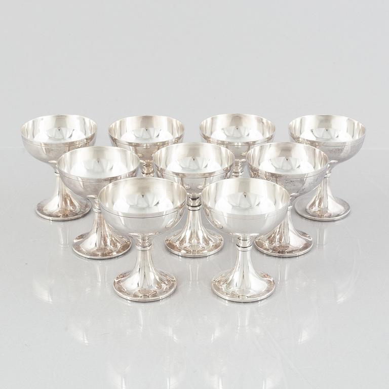 Oscar L. Olausson, cup, 9 pcs, silver, Stockholm, 1947.