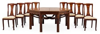498. A Swedish Art Noveau mahogany dinner table with eight chairs, Kullman & Larsson, Malmö 1914.