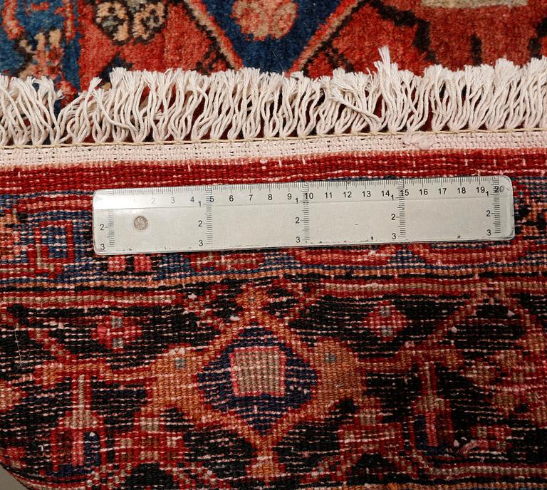 A Bidjar rug, semiantique, 330 x 150 cm.