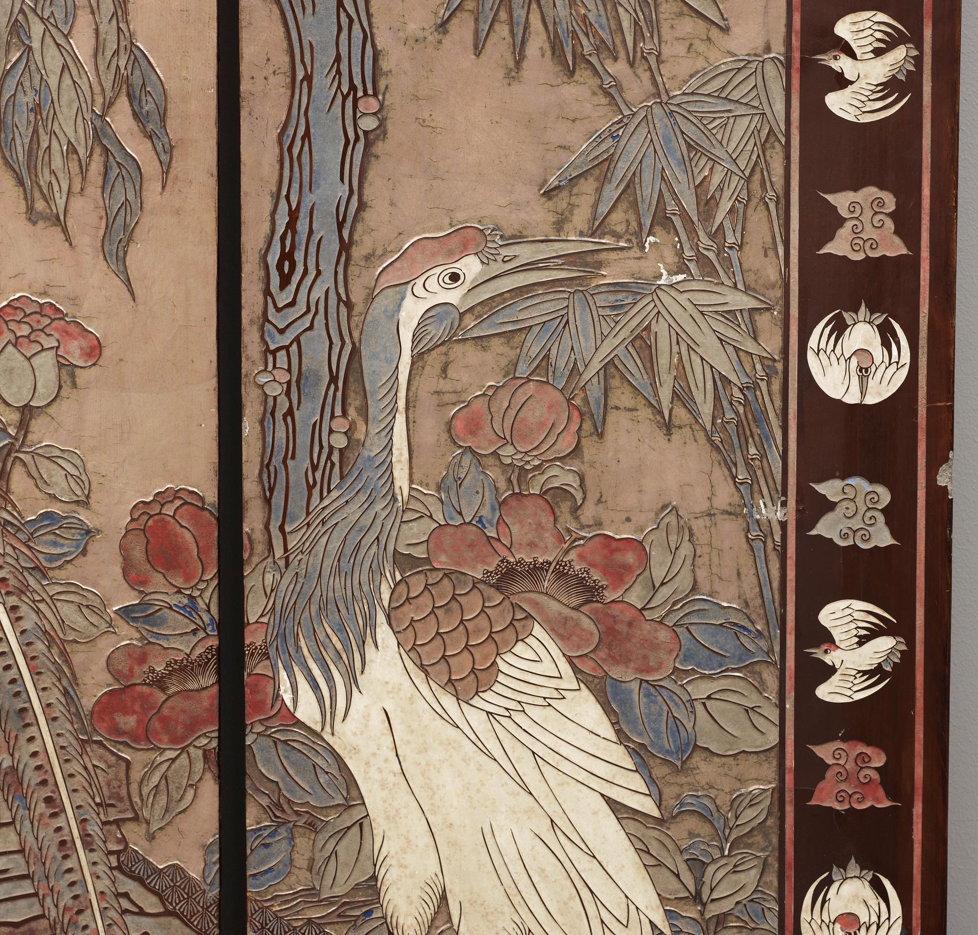 A coromandel black-lacquer four panel screen, Qing Dynasty (1644-1912).