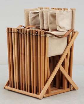 A set of six folding chairs with stand by Mogens Koch, Interna, Denmark.