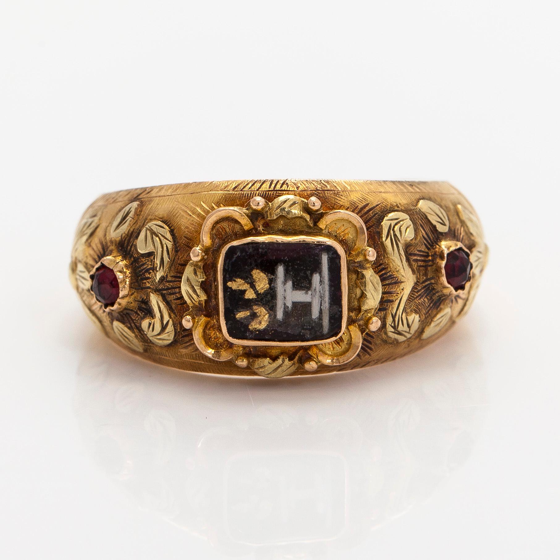 Ring, 18K gold, enamel, garnets, Bernt Erland Wallin, Tampere, second half of the 19th century.
