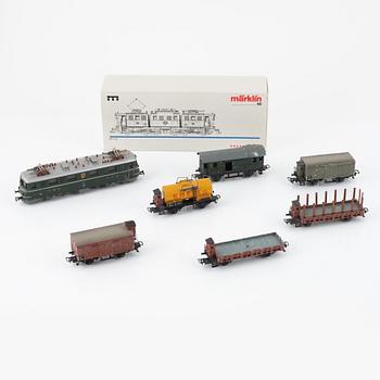 Märklin, two electric locomotives, model 3528 and 3338, and six cargo cars, gauge H0.