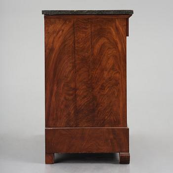 A French Empire mahogany commode, early 19th century.