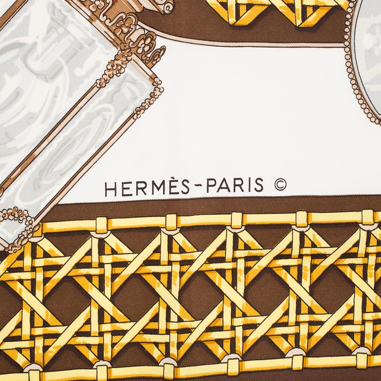 An Hermès "Feux de Route" silk scarf.