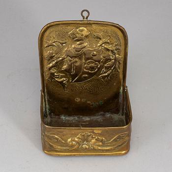 A 19th century brass spoon holder.