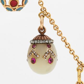 A FABERGÉ  GOLD Chain Necklace WITH 8 GOLD, ENAMEL ETC MINIATURE EASTER EGG PENDANTS, S.T PETERSBURG and 3 other.