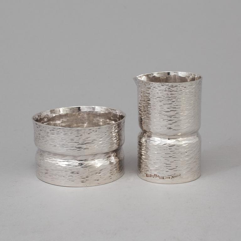 A silver Sugar bowl and a creamer by MICHAEL CHAVANNE, Stockholm 1977.