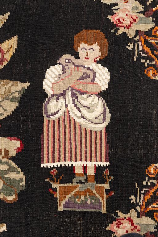 A Kelim carpet, Moldova, dated 1939, circa 385 x 174 cm.