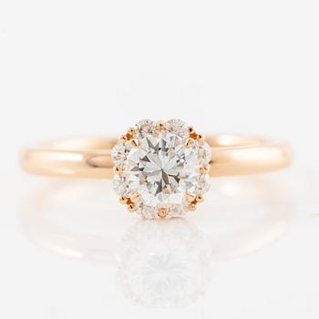 Ring 18K guld med briljantslipad diamant. Medföljande IGI report.