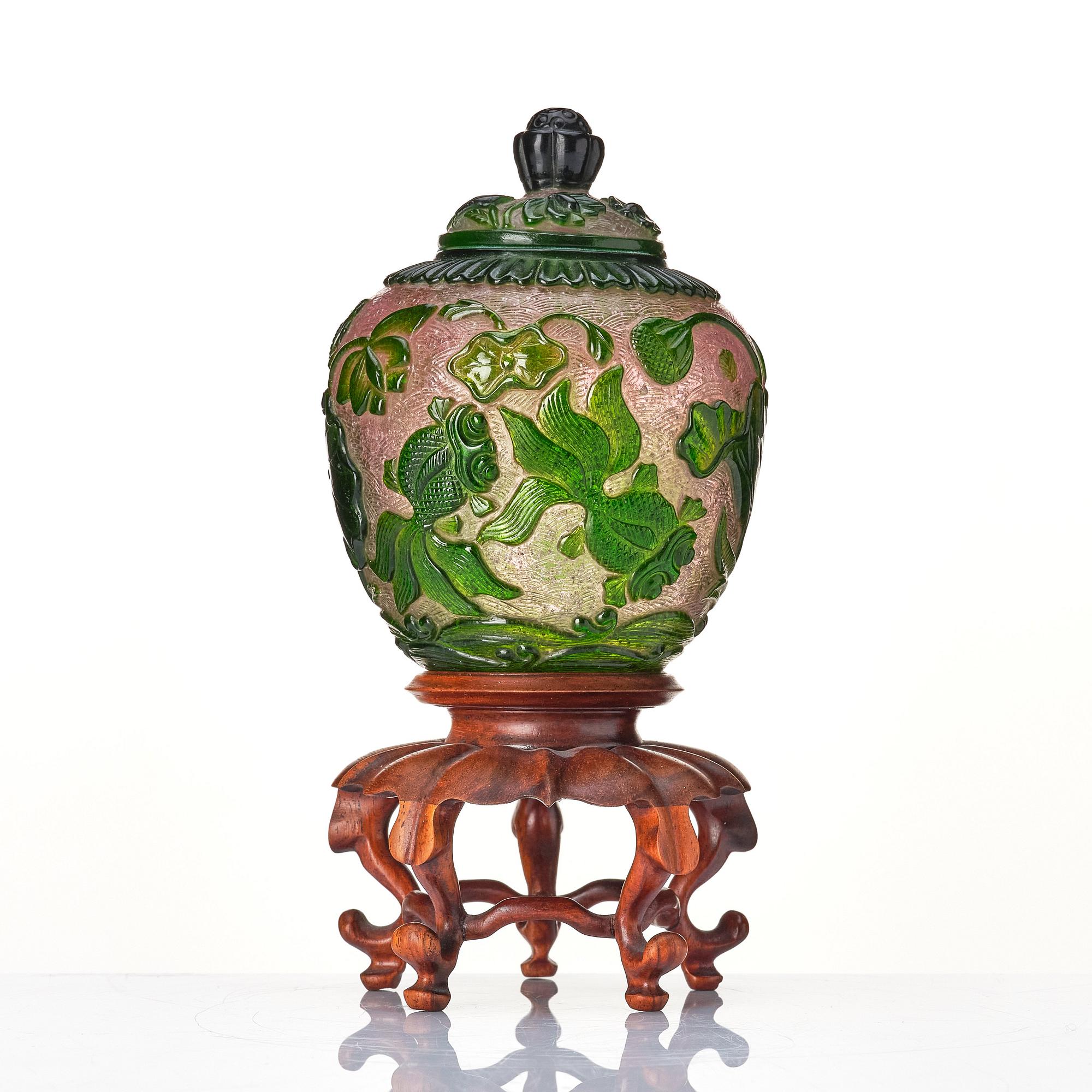 A peking glass jar with cover, Qing dynasty, with Qianlongs four character mark.