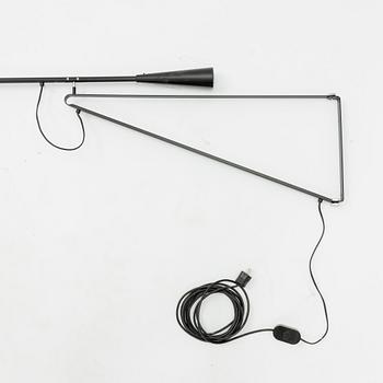 Paolo Rizzatto, a model 265 wall lamp, Flos, Italy.