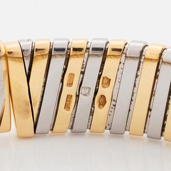 A Bulgari "Tubogas" bracelet in 18K gold and steel.