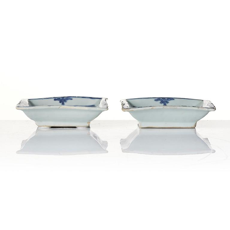 A pair of blue and white 'lotus' dishes, Ming dynasty (1368-1644).