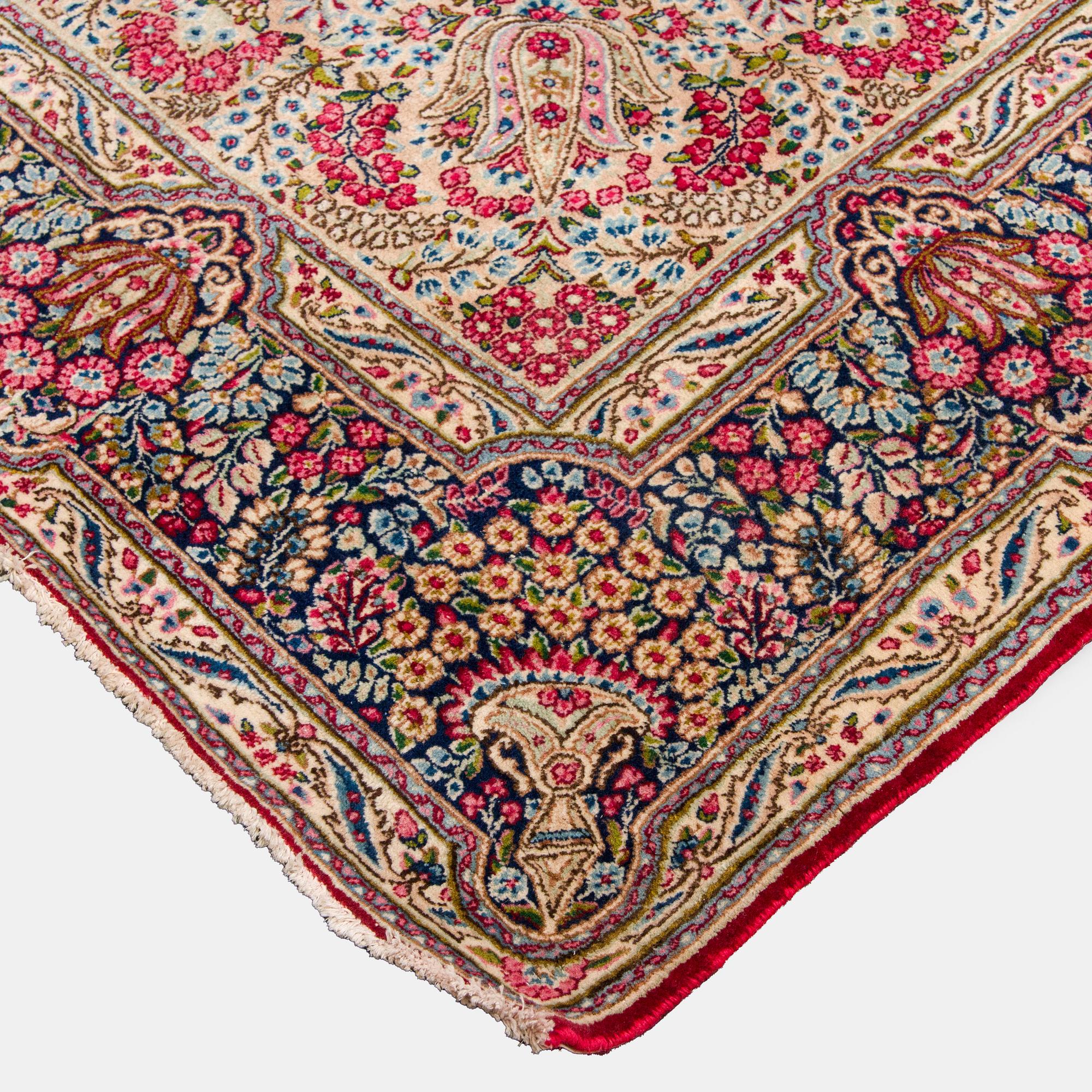 A carpet, Kirman, ca. 333 x 244 cm.