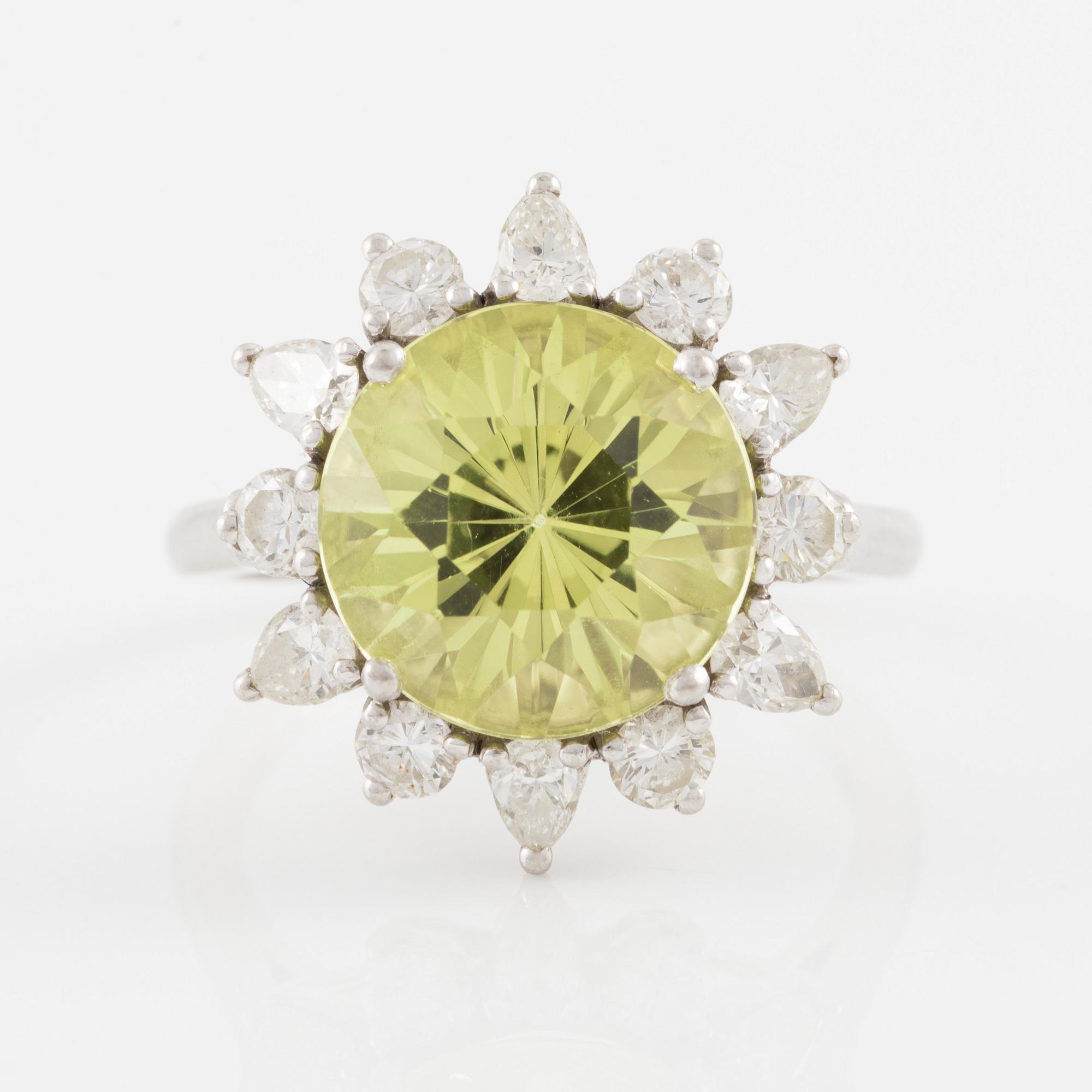 Ring, in the form of a flower, platinum with chrysoberyl and drop-cut and brilliant-cut diamonds.