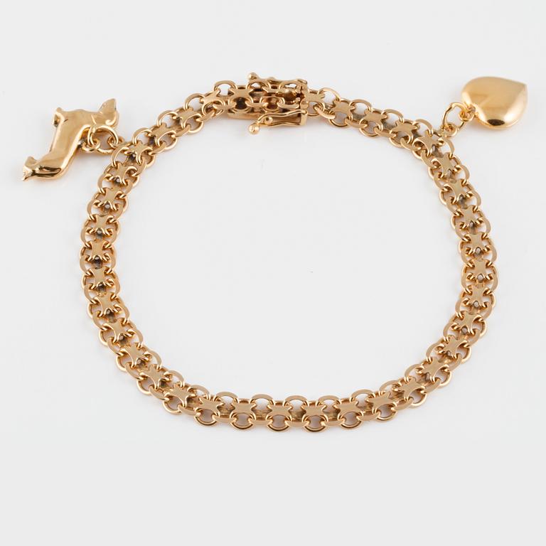 ARMBAND med 2 BERLOCKER, 18K guld, Bröderna Heden, Stockholm, 1969. Vikt 9,6 gram.