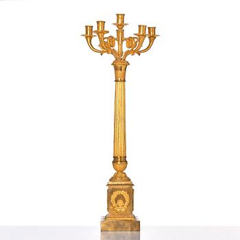 A French late Empire gilded six-light candelabra, mid 19th century.