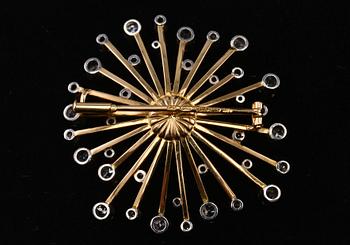 A BROOCH, 18K gold, old cut diamonds c. 1,5 ct. A. Tillander 1963. Weight 16,8 g.
