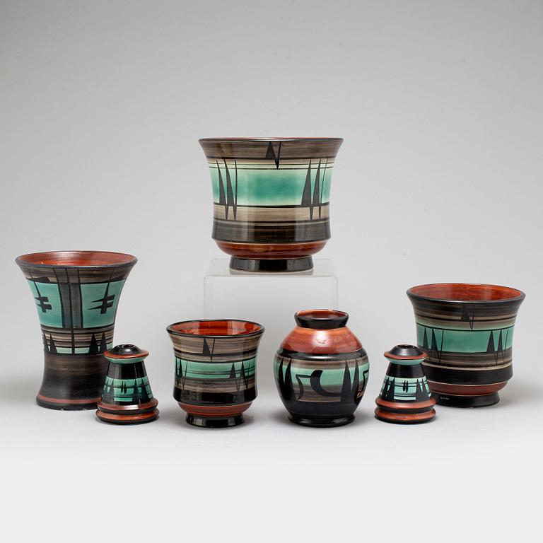 MAGGI WIBOM, a set of 7 faience vases, flower pots, candle holders, Bo Fajans, Sweden, 1920-30s.