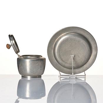 Josef Frank, a four-piece pewter tea set and a plate, model "A2330", Firma Svenskt Tenn, Stockholm 1946 (plate 1929).