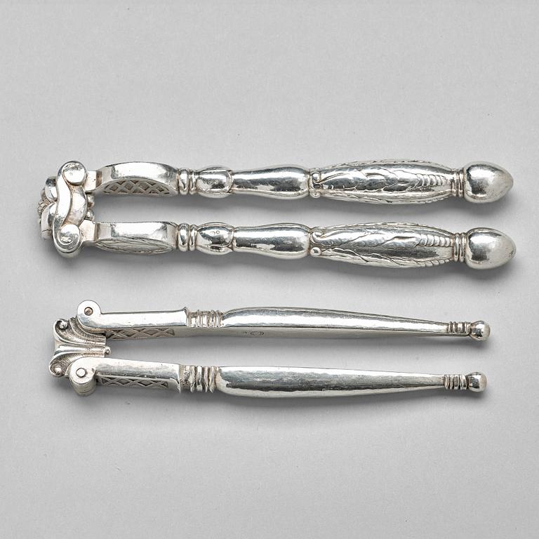 Georg Jensen, OCH JOHAN ROHDE, nötknäppare, 2 st, Firma Georg Jensen, Köpenhamn 1919-27, 830/1000.