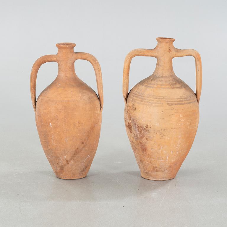 Two European earthenware jars from the first half of the 20th century.