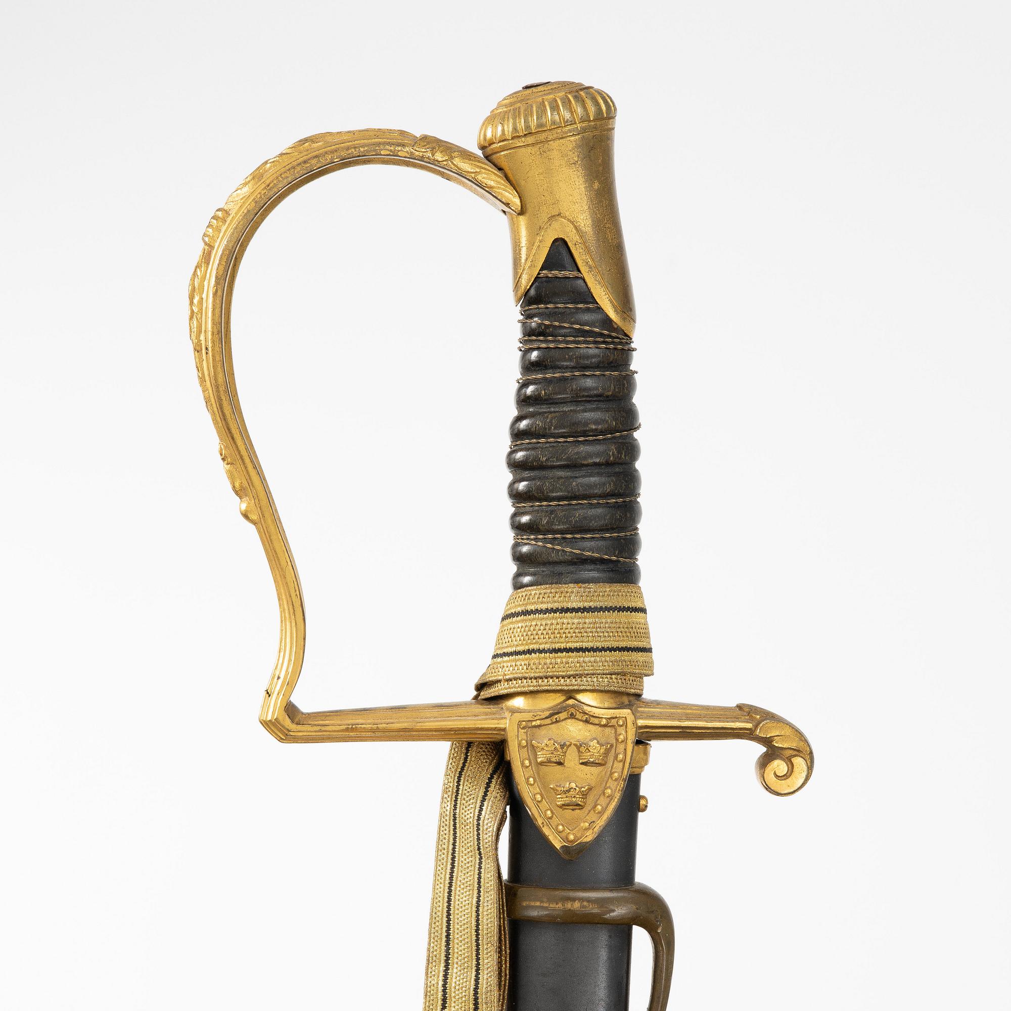 A Swedish artillery officer's sabre, 1889 pattern with scabbard.
