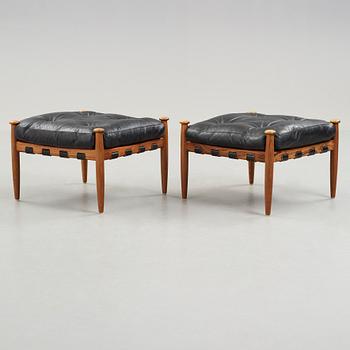 A pair of 'Amiral' easy chair by Eric Merthen.