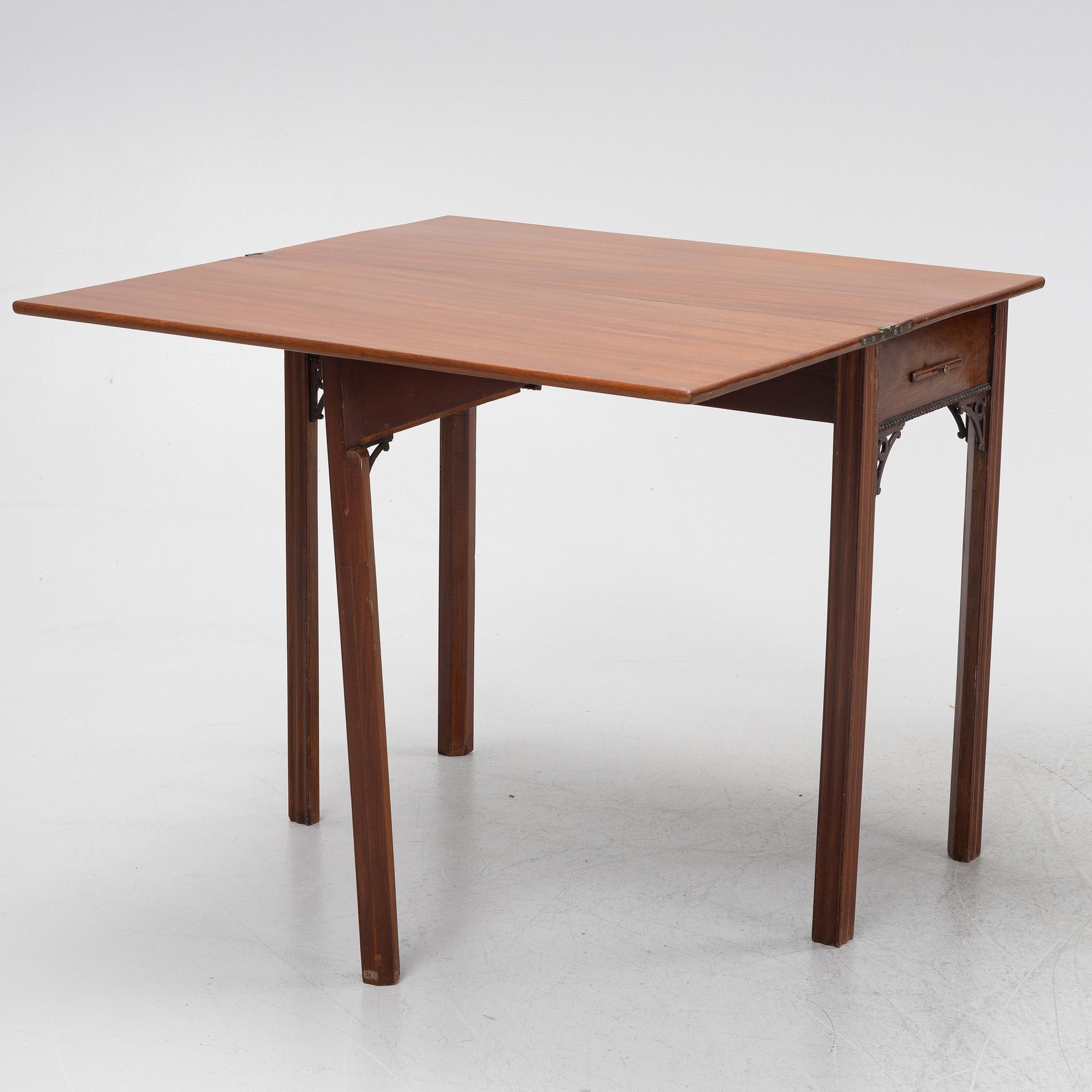 A macthed pair of late Gustavian mahogany veneered card tables one by C D Fick, Stockholm 1776-1806.