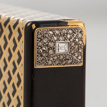 Cartier Art Deco Vanity Case 18K guld med svart emalj och baguette- och rosenslipade diamanter.