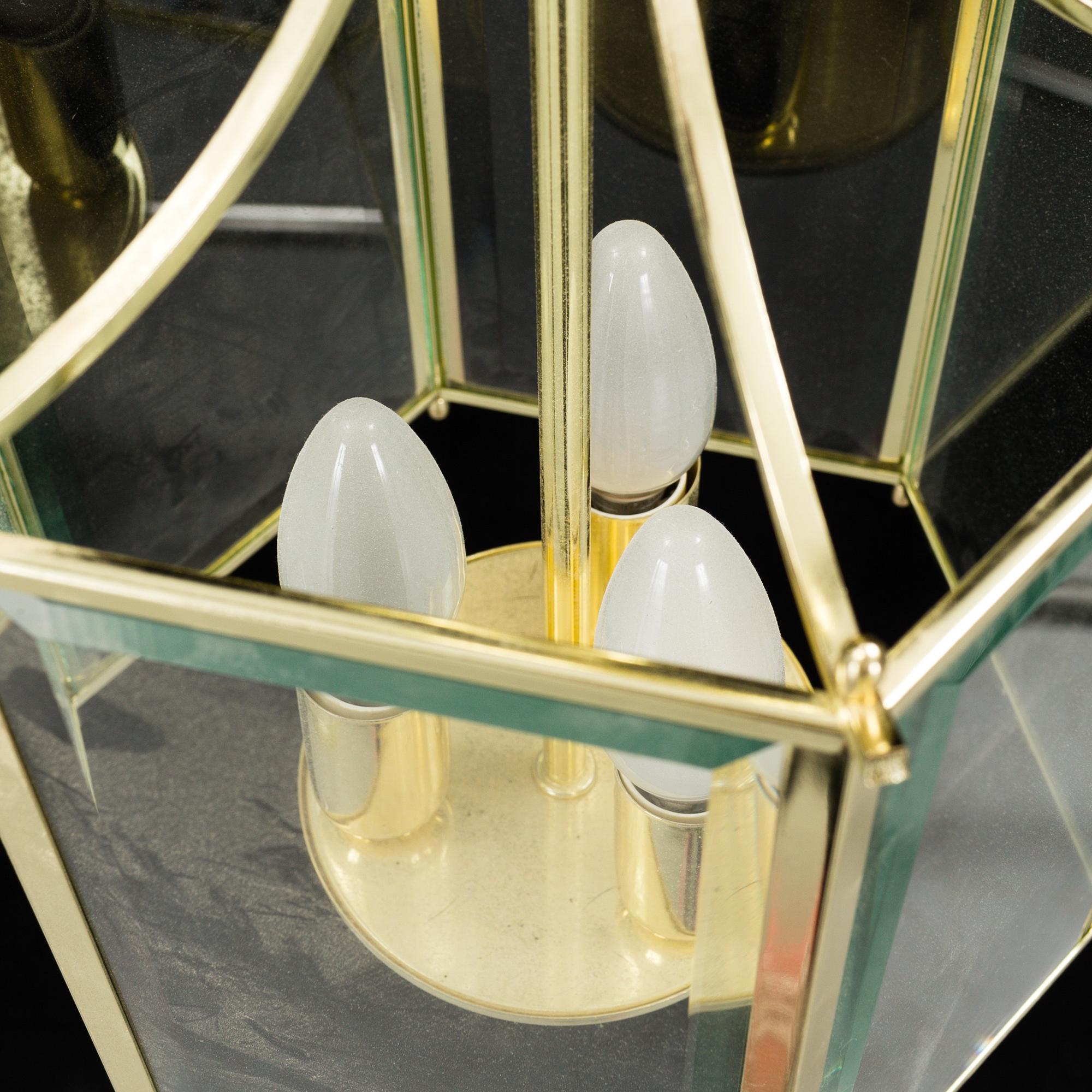 A 20th century brass hexagon hall ceiling lantern for three lights.