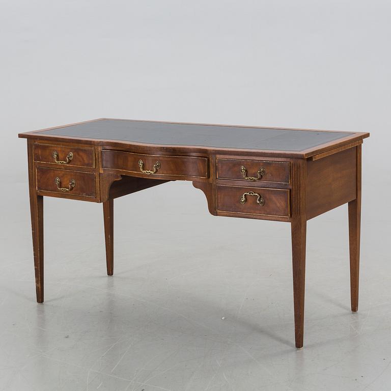 A Reprodux English writing desk.