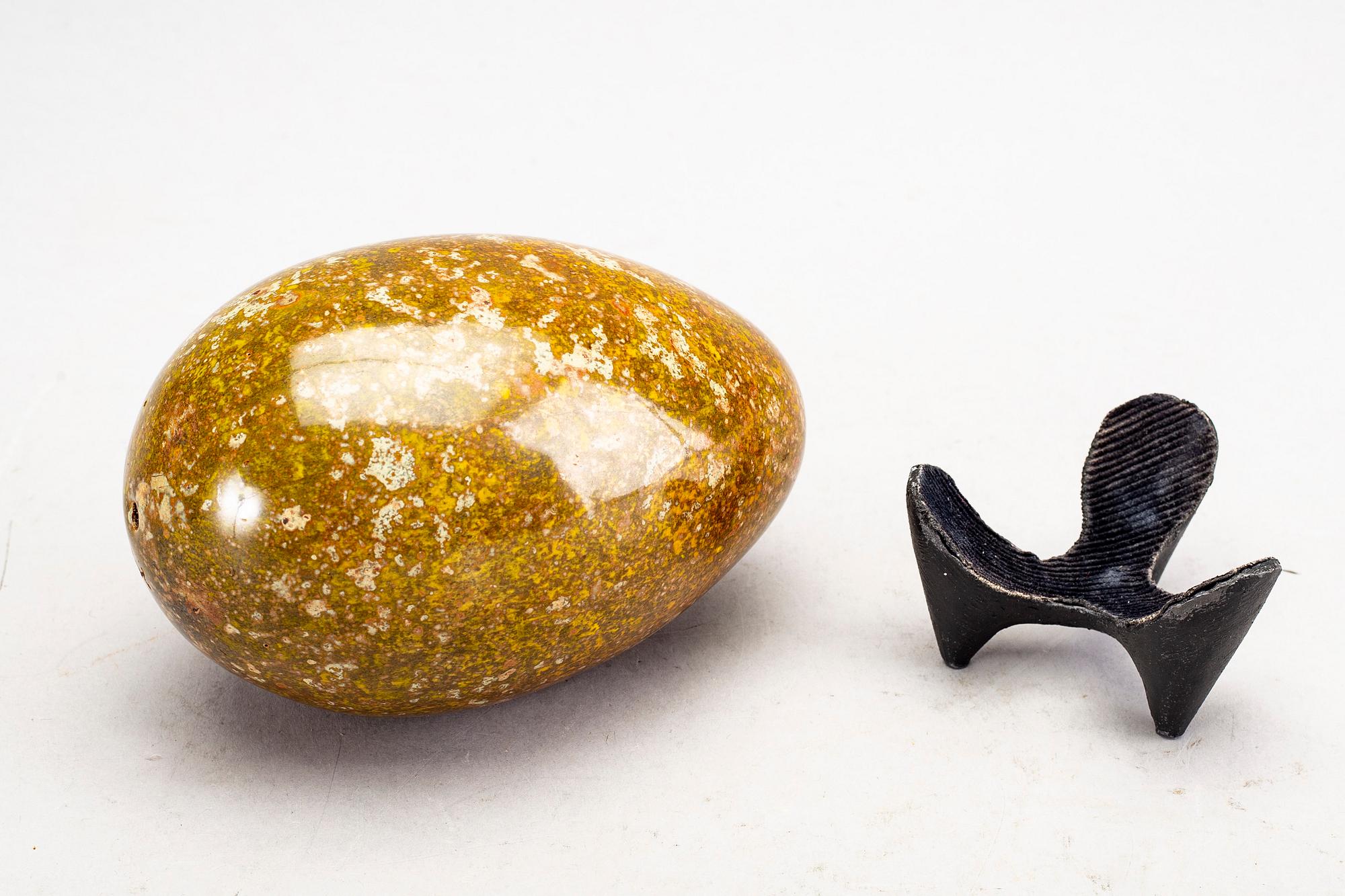 A faience sculpture of an egg by Hans Hedberg, Biot, France.