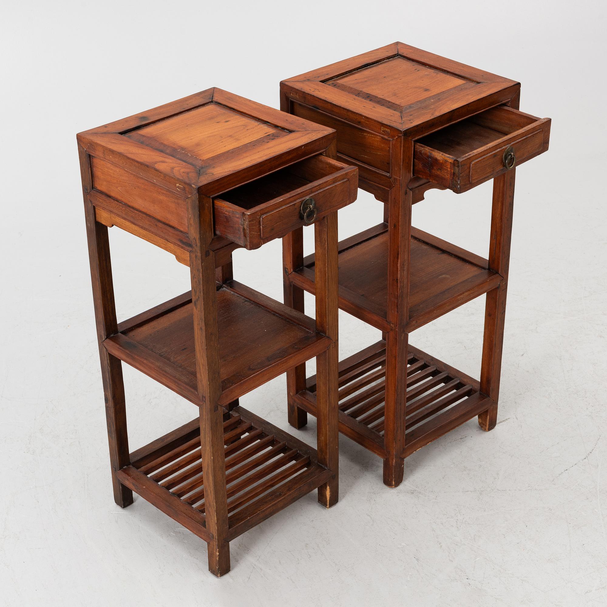 A pair of Chinese lamp tables / pedestals, hardwood, 20th century.