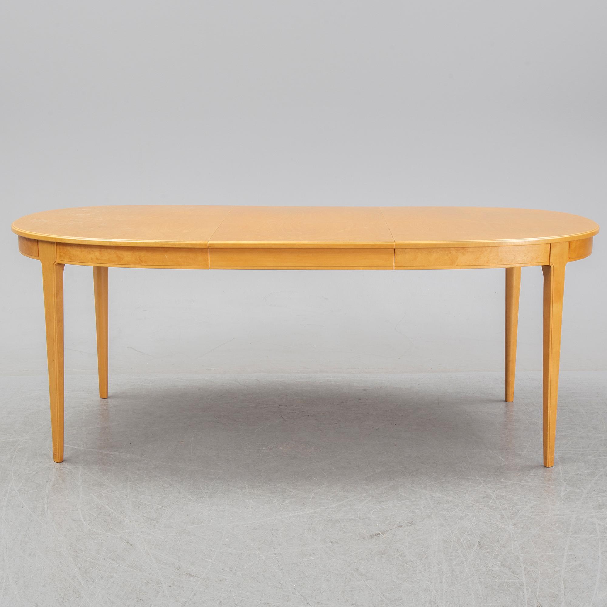 Carl Malmsten, a set of six 'Ambassadör' chairs and a 'Herrgården' dining table, second half of the 20th Century.