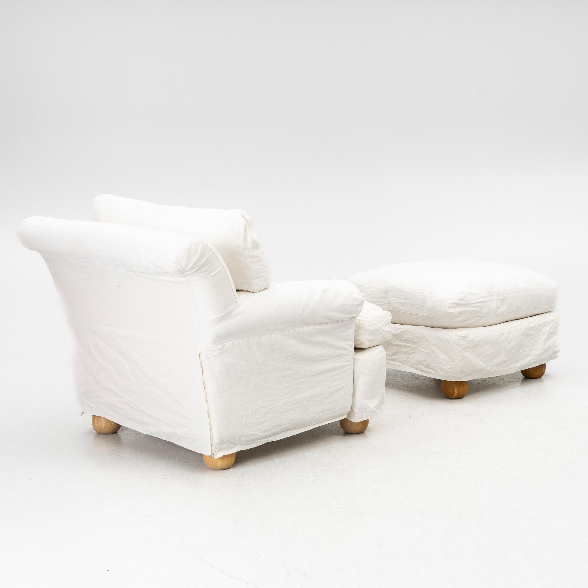 An armchair with ottoman, contemporary.