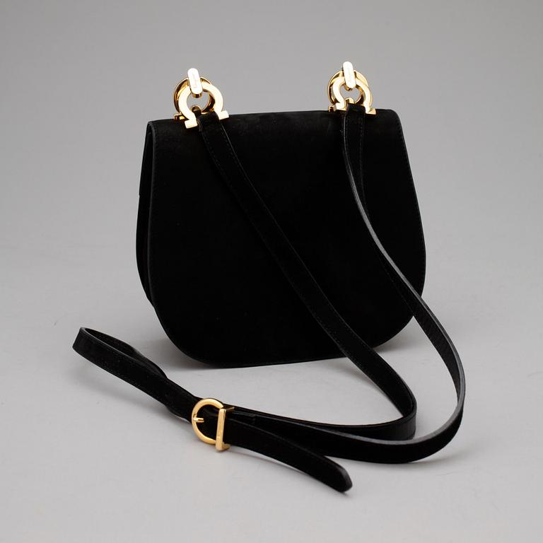 SALVATORE FERRAGAMO, a black suede shoulder bag.