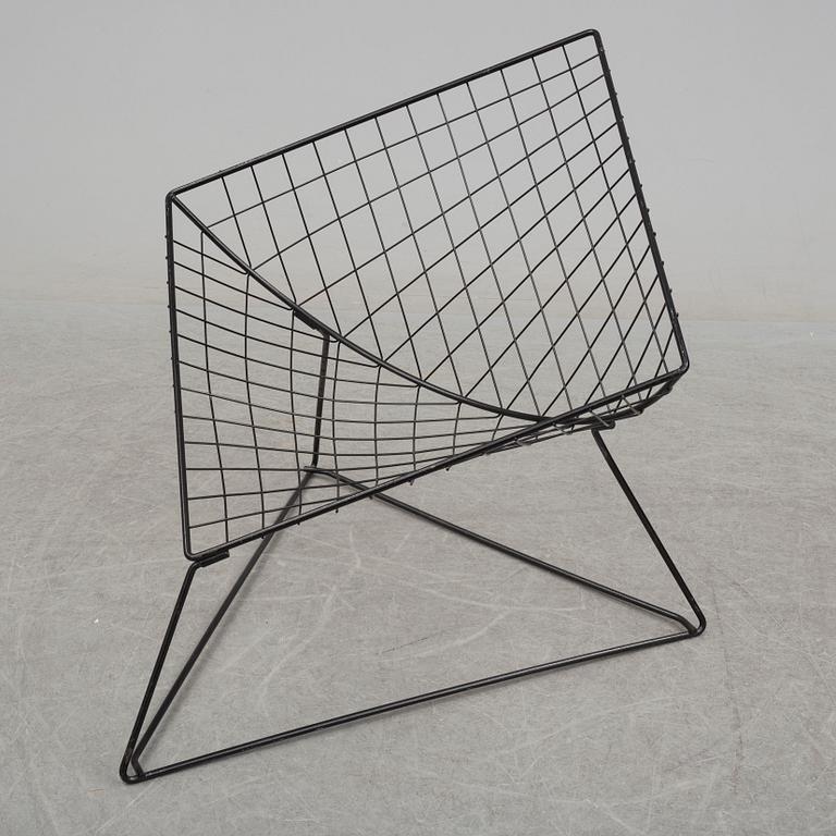 NIELS GAMMELGAARD, an 'Oti' easy chair from IKEA.