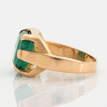 Emerald-cut emerald.