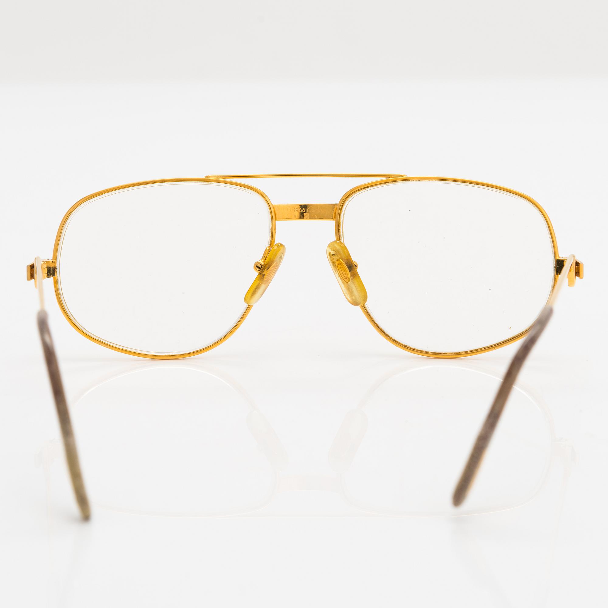 must de Cartier, Santos, Glasögonbågar. Märkta Cartier, Paris, Made in France 135, 54, 16.