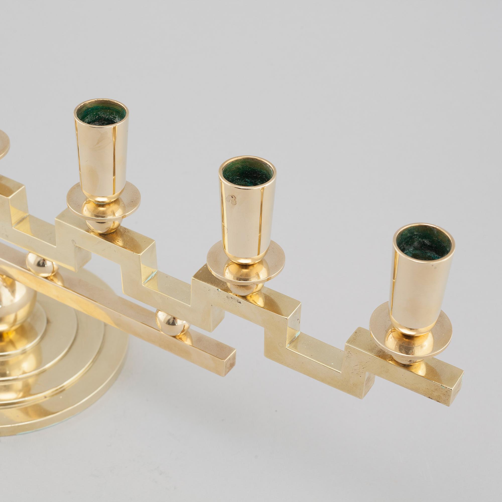 A brass candelabra, attributed to Firma Lars Holmström in Arvika, 20th cenutry.