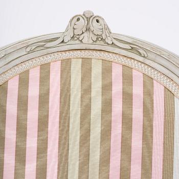 A pair of Gustavian open armchairs by E. Öhrmark (master in Stockholm 1777-1813).