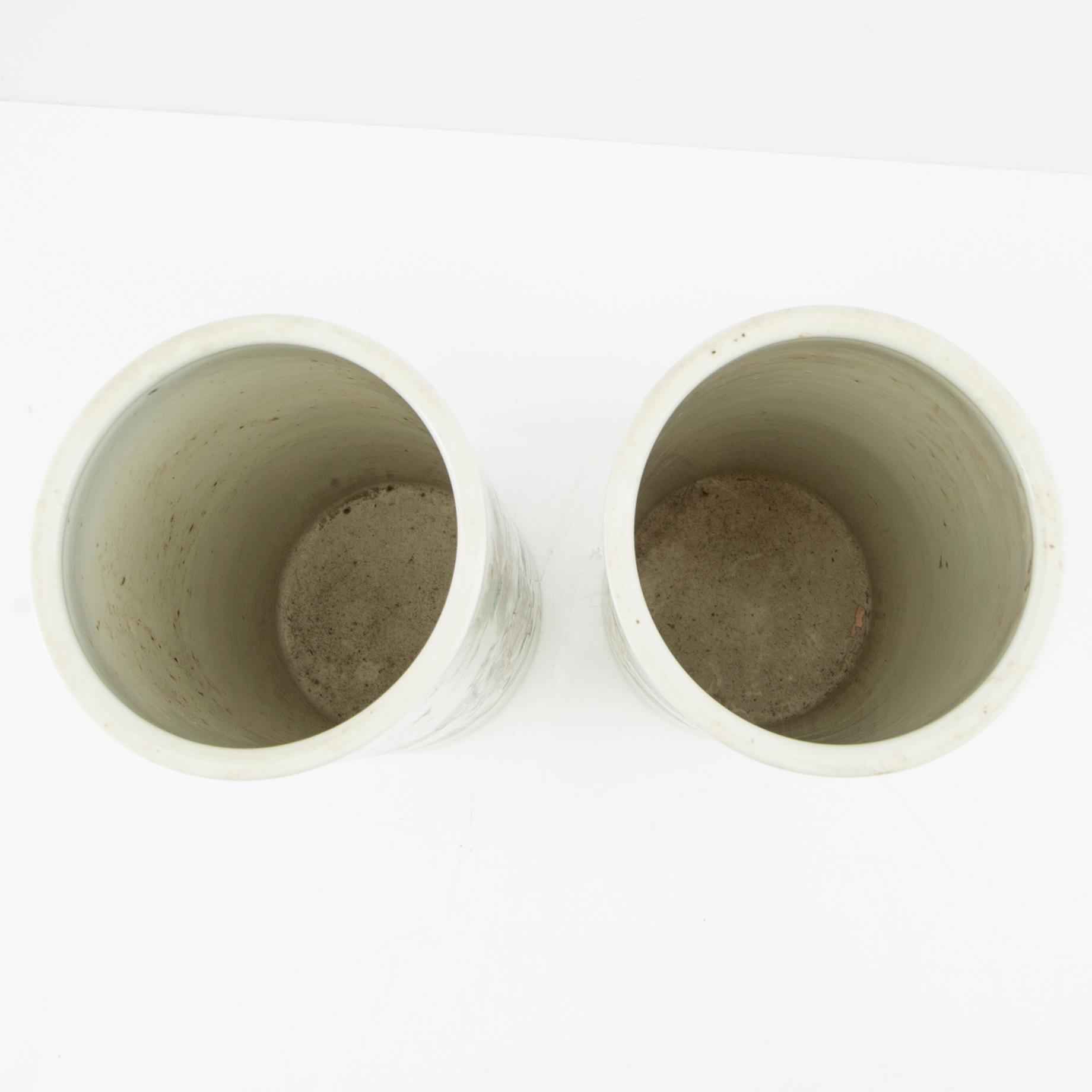 A pair of Chinese brush vases, 20th century.
