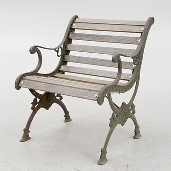 A cast-iron frame garden chair, 20th century.