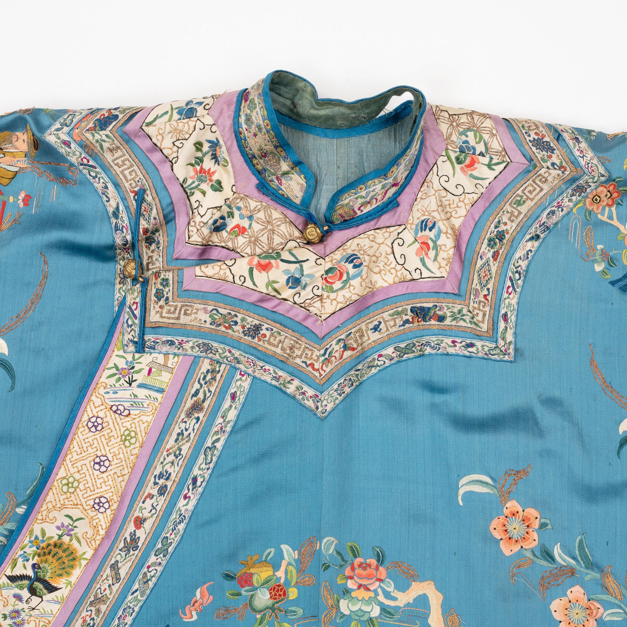 A Chinese embroidered robe, early 20th Century.