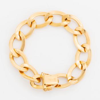 An 18K gold Jan Hellströmer bracelet.