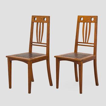 Dining table and six chairs, early 1900.