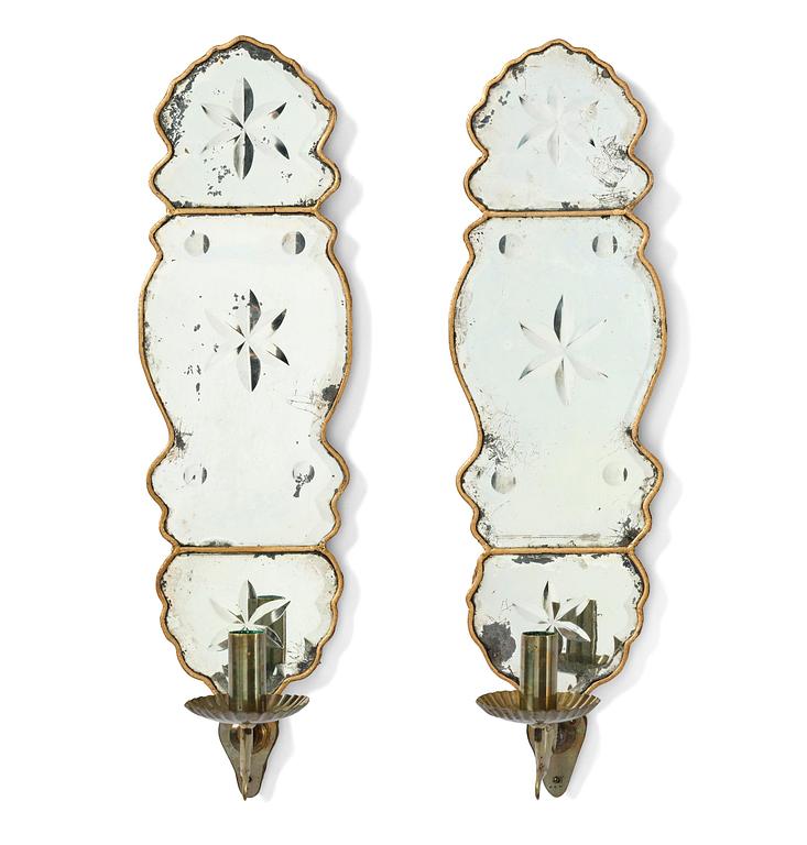 A pair of Swedish late Baroque one-branch girandole mirrors, mid 18th century.