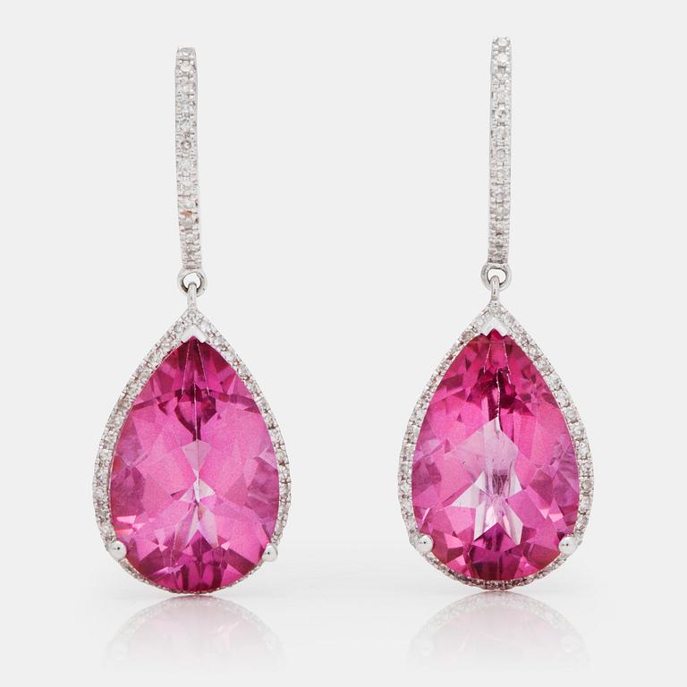 A pair of drop-shaped pink tourmaline and brilliant-cut diamond earrings.